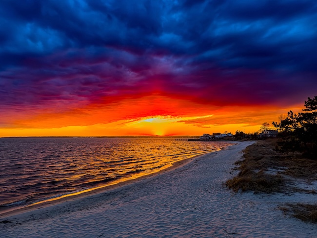 Webby's Beach Sprint sunset with a cloudy sky